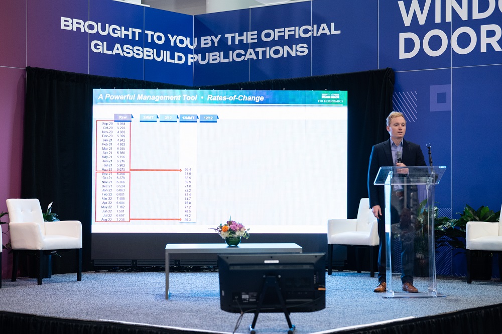 Connor Lokar speaks to GlassBuild attendees at the Main Stage