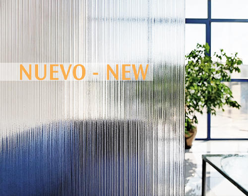 Sevasa Lineas Collection glass partition shown in an office, obscuring the view from one room into the next